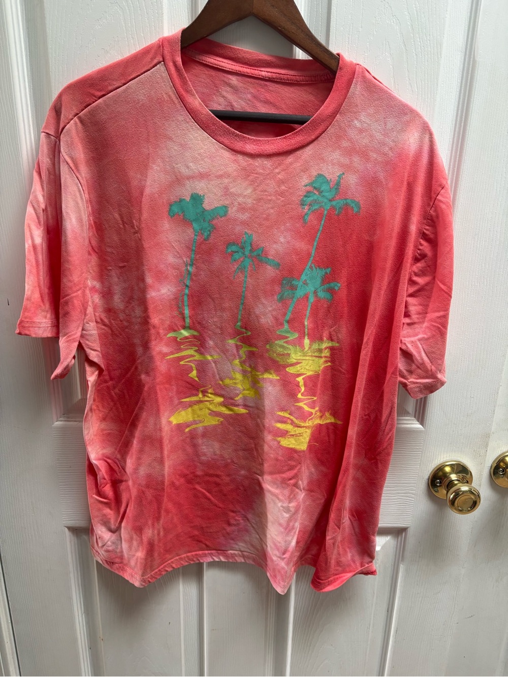 belk Coral Tie-Dye Short Sleeve Tee with Teal Palm Trees and Yellow Accents